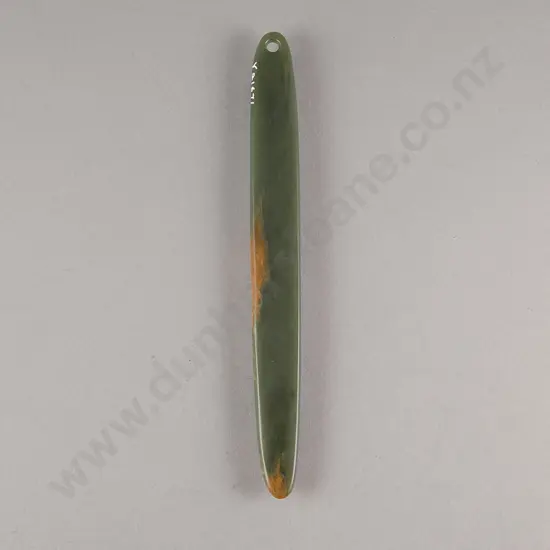 A Large Pounamu Kuru (Pendant)