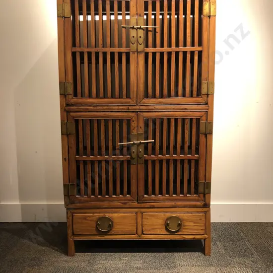 Chinese Fruitwood Four Door Cabinet on Two Drawer Base