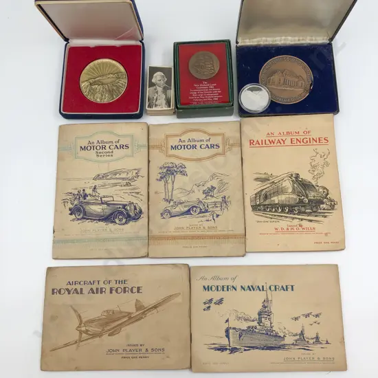 Box of Assorted Cigarette Card Albums and Commemorative Coins Etc.