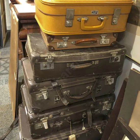 Seven Assorted Vintage Suitcases