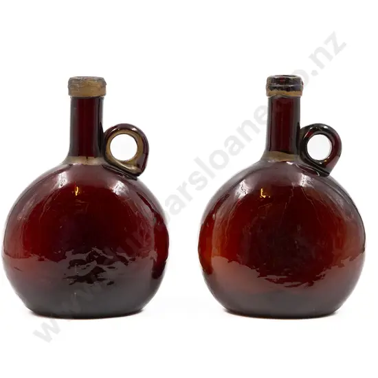Two Victorian Brown Glass Decanters