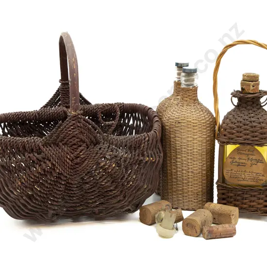 Wicker Basket with Three Bottles and Quantity of Corks