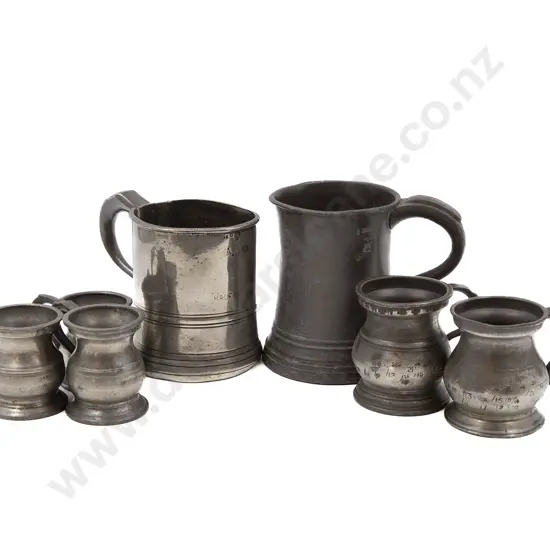 Seven Small Pewter Tankards