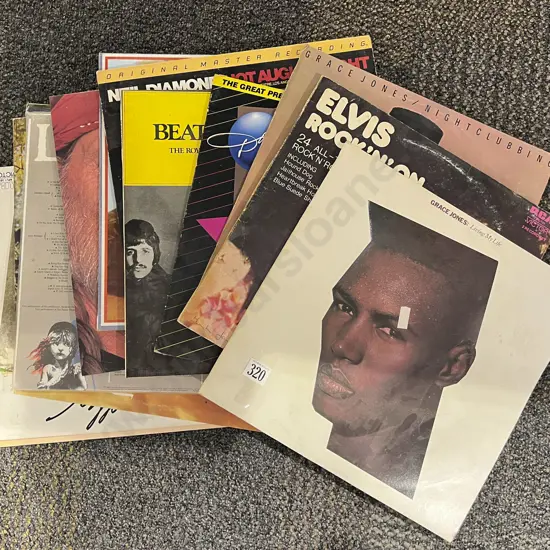 Small Quantity of Assorted Records Incl. Johnny Cash and Dolly Parton Etc.