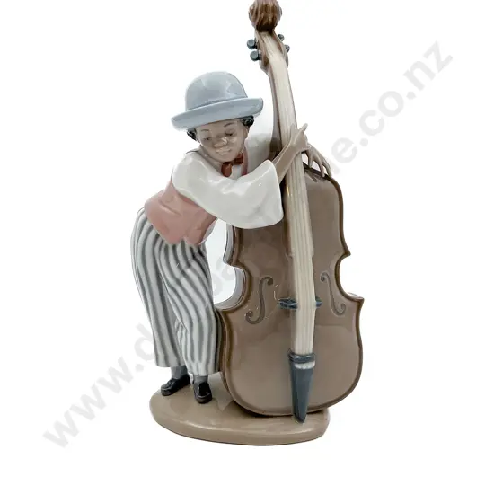 Lladro Figure of Boy Playing Bass