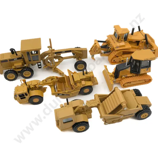 Five Assorted Earthmoving Toys Including Caterpillar and John Deere