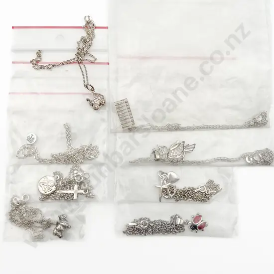 Eight Assorted S/S Charms on Chain