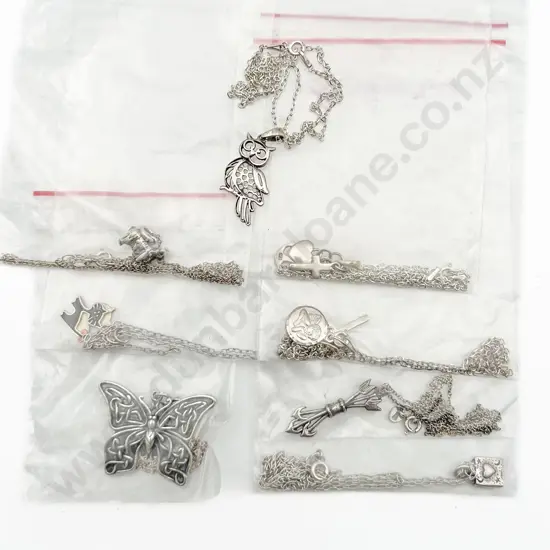 Eight Assorted S/S Charms on Chain