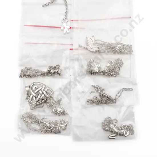 Eight Assorted S/S Charms on Chain