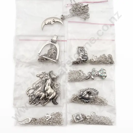 Eight Assorted S/S Charms on Chain