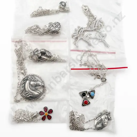 Eight Assorted S/S Charms on Chain