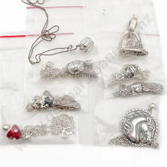 Eight Assorted S/S Charms on Chain