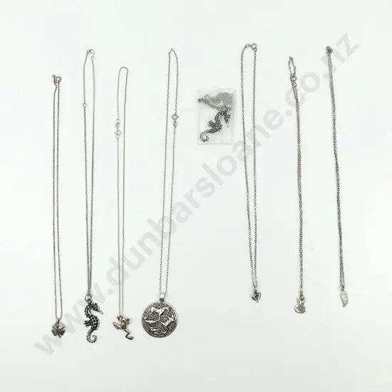 Eight Assorted S/S Charms on Chain