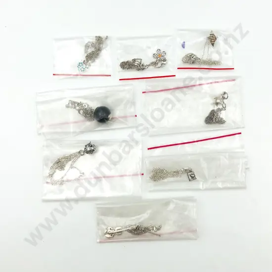 Eight Assorted S/S Charms on Chain