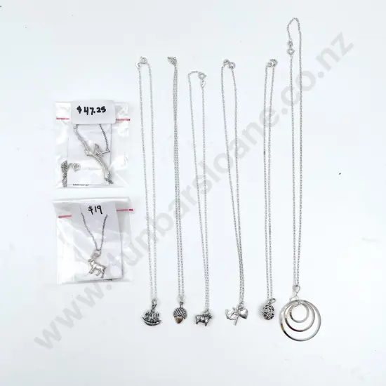 Eight Assorted S/S Charms on Chain