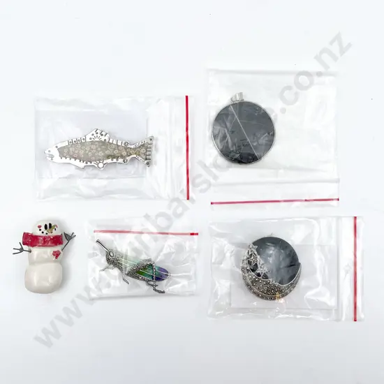 Four Various Brooches and Pendant