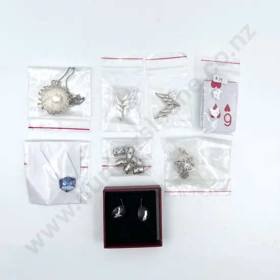 Four Assorted S/S Pendants