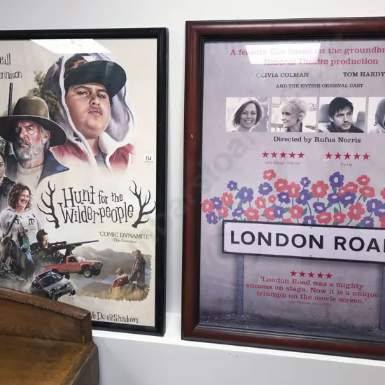 Two Framed Movie Posters