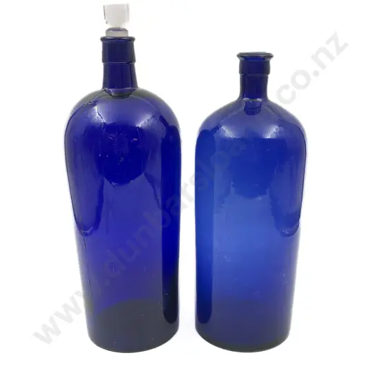 Two Blue Glass Bottles (One Missing Stopper)