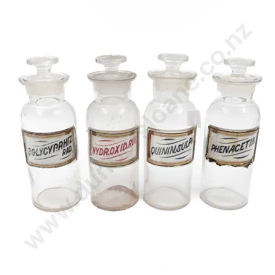 Six Small Labeled Stoppered Chemist Bottles