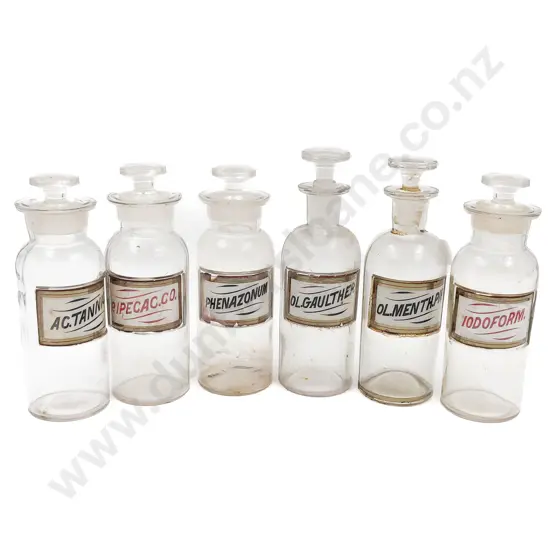 Six Small Labeled Stoppered Chemist Bottles