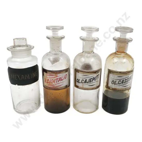 Four Small Labeled Stoppered Chemist Bottles