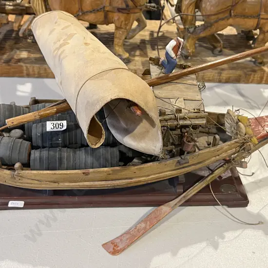 Wooden Sailboat With Barrels