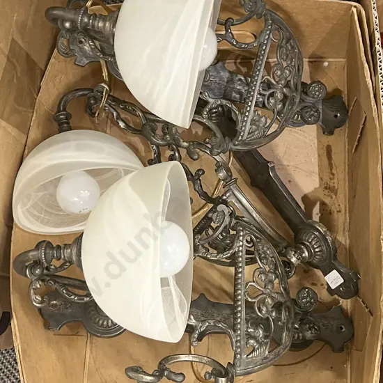 A Trio of Cast Metal Wall Lights with Frosted Glass Shades