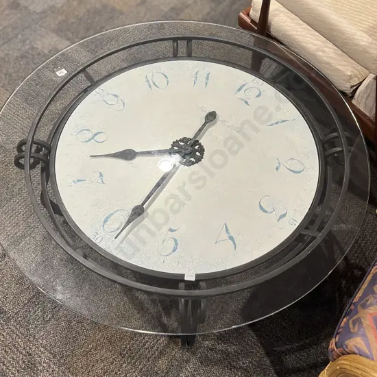 Glass Top Circular Coffee Table with Clock to Interior
