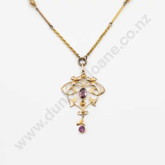 Edwardian 9ct Shield Pendant set with Two Amethysts