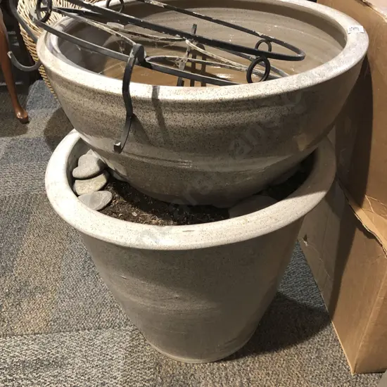 Two Grey Plant Pots Together With Wrought Metal Stand and Two Boxes Of Decorative Stones