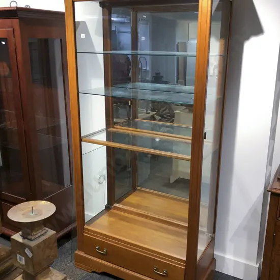 Glazed China Cabinet With Glass Shelves and Doors to Side