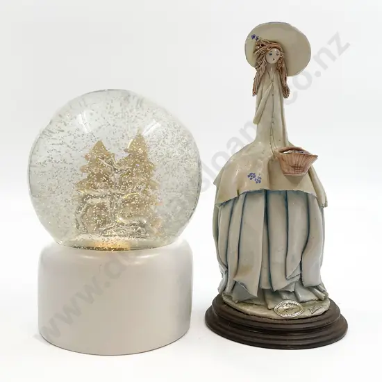Pottery Figure Together With Snow Globe