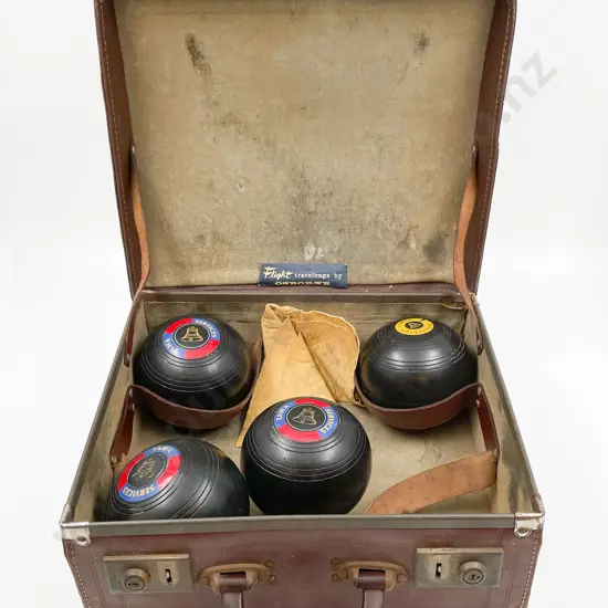 Four Lawn Bowls in Case