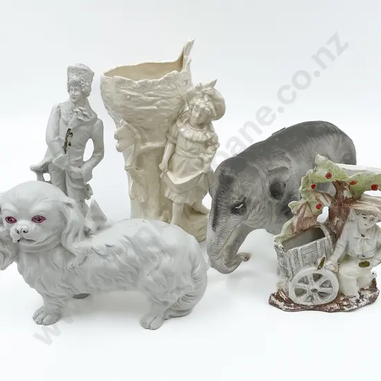 Two Figural Vases with Three Other Ornaments