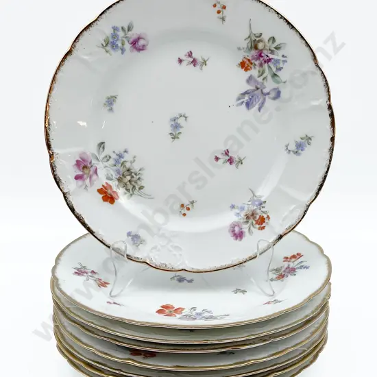 Eight German Porcelain Floral Decorated Plates