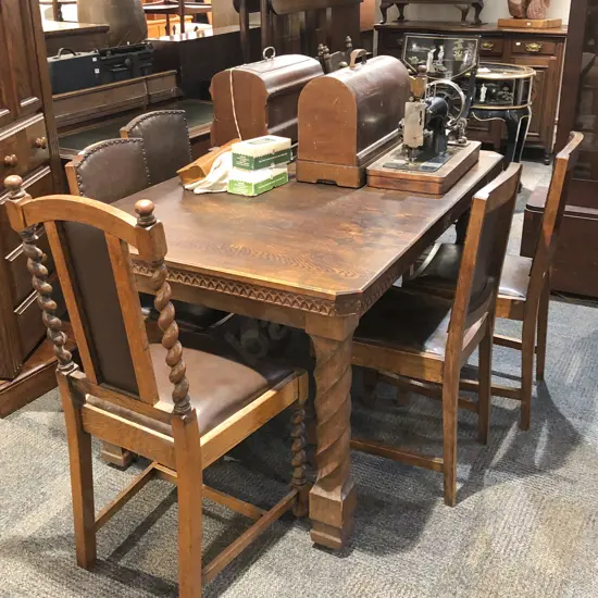 Oak Extension Dining Table With Four Leather Seat Dining Chairs and Two High Back Barley Twist Dining Chairs