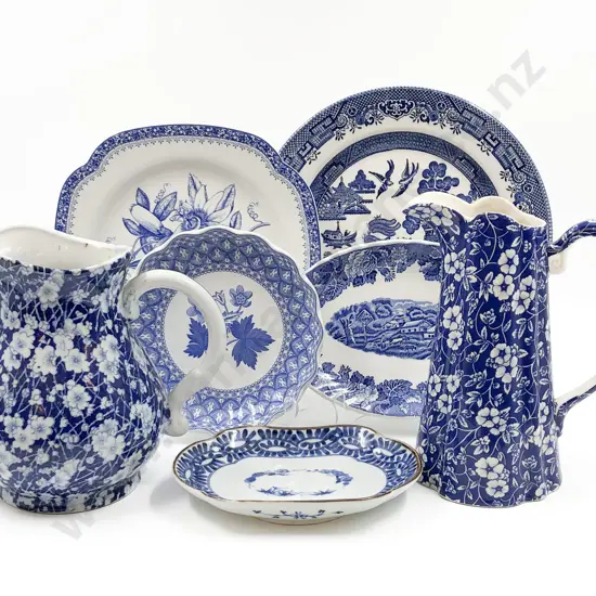 Two Blue and White Jugs and Five Plates
