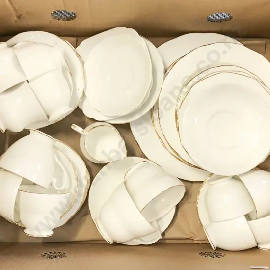 Two White China Tea Sets