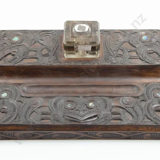 A Carved Maori Desk Stand With Glass Ink Well