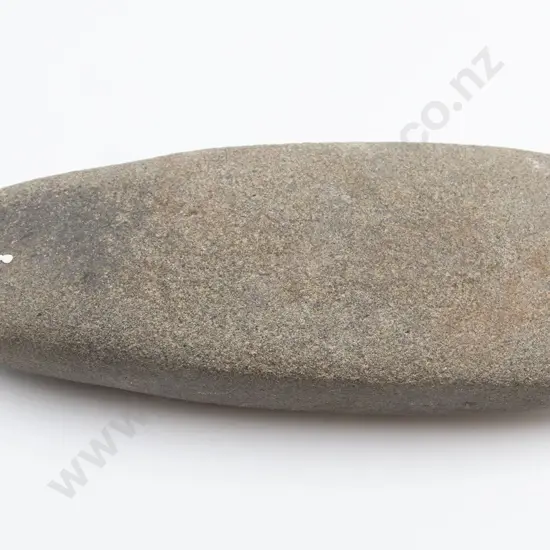 A Pre-European Toki (Volcanic Stone)