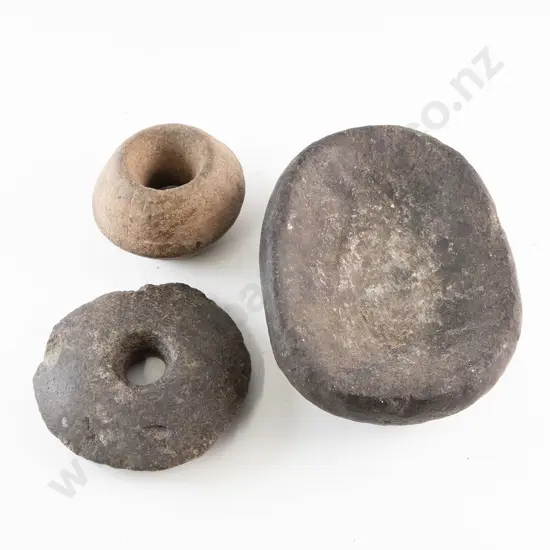 Two Stone Mace Heads And A Stone Grinding Slate