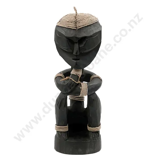 Indonesian Sitting Figure