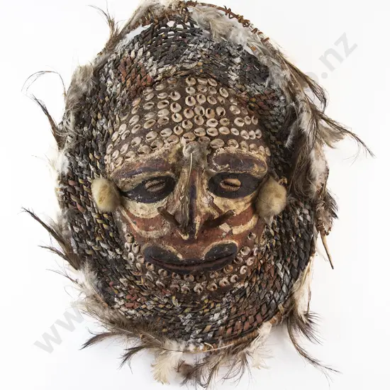 A Papua New Guinea Clay On Raffia Painted Mask