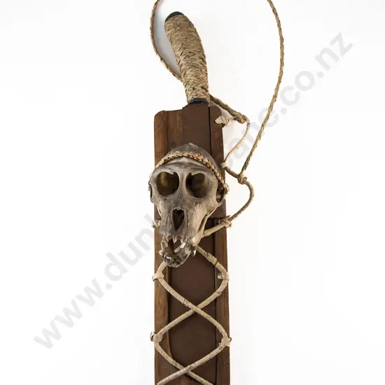 A Dayak Machete With A Monkey Skull Sheath