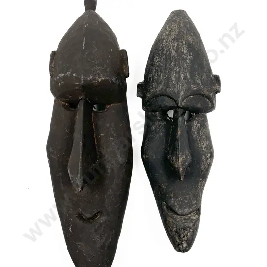 Two Blackened Wood Papua New Guinea Masks