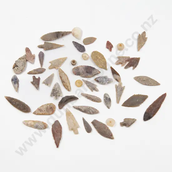 A Collection Of Neolithic Tools And Beads