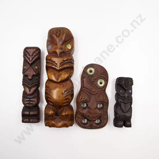 Three Carved Pou Whakairo Figures With Tiki