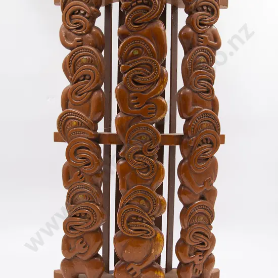 A Maori Wall Hanging With Carved Wheku Figures