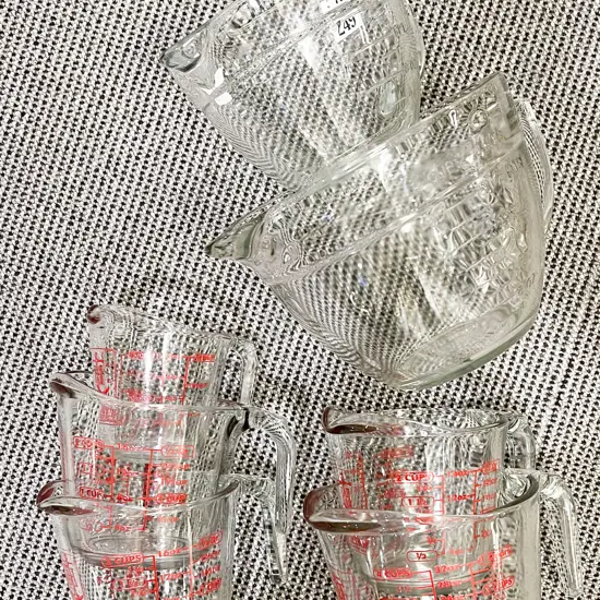 Seven Assorted Glass Kitchen Measuring Jugs